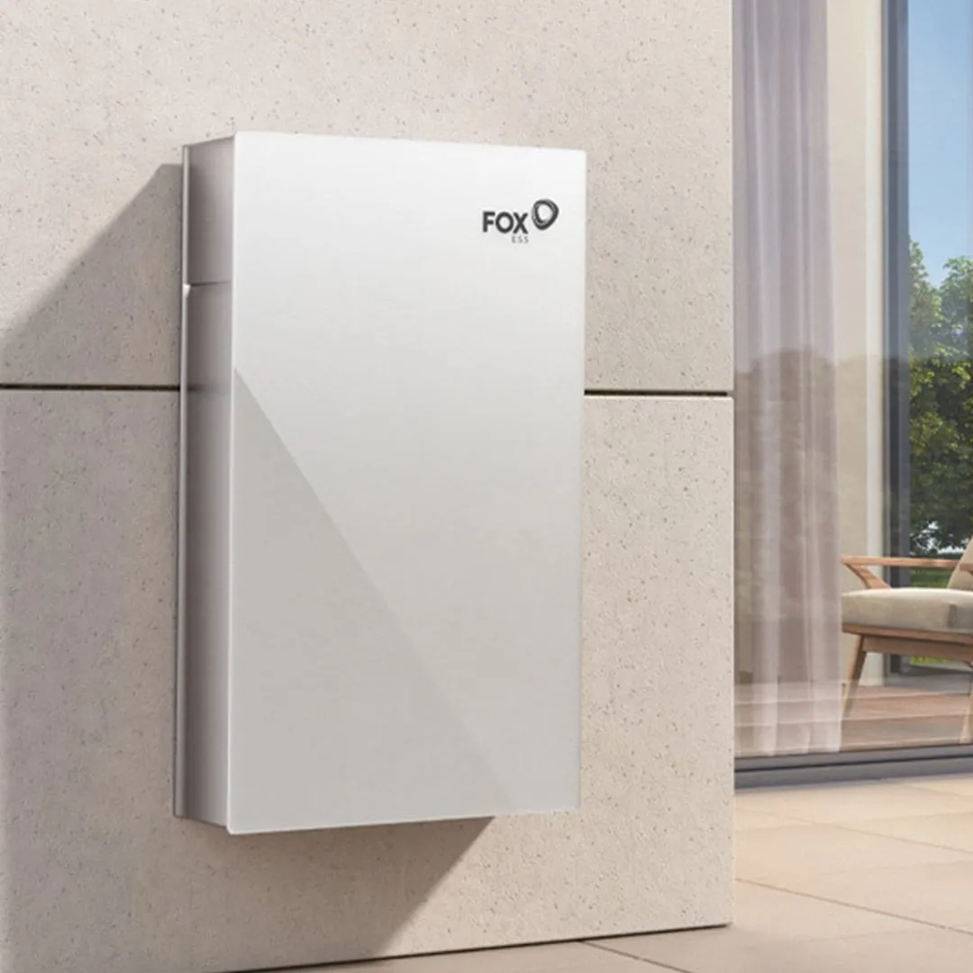 A Fox ESS home solar battery mounted on an exterior wall